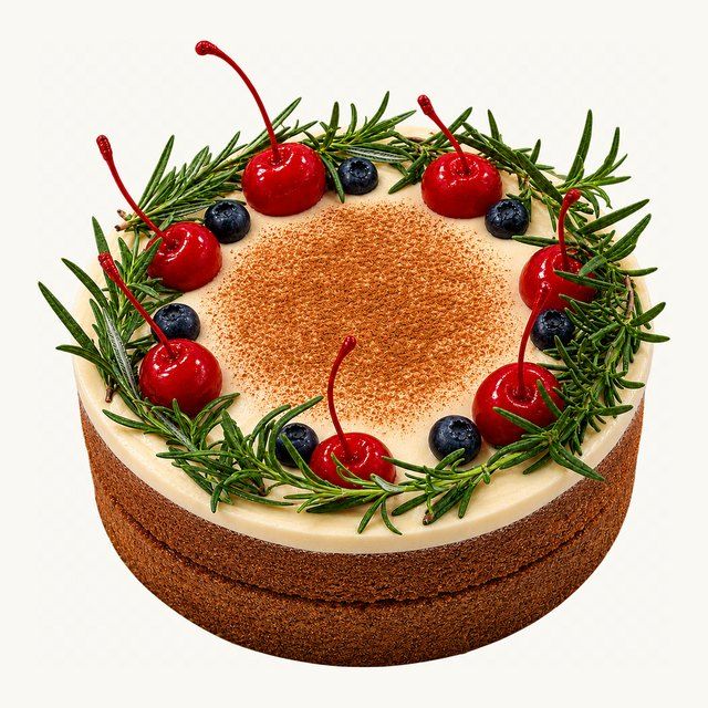 Maple Apple Cake with a cinnamon-dusted top, cherries and rosemary